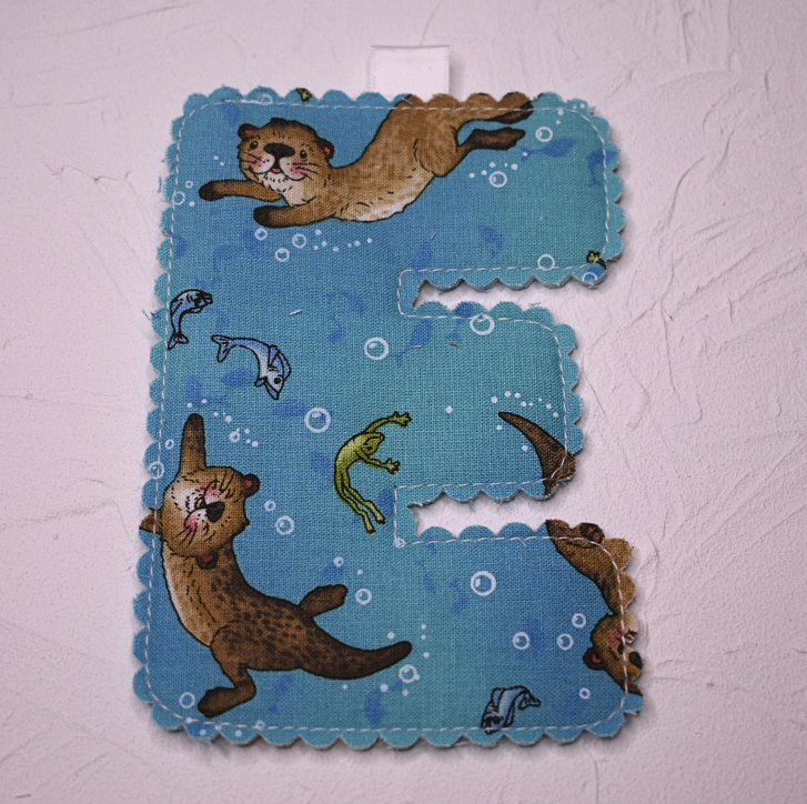 Scolloped letter - E