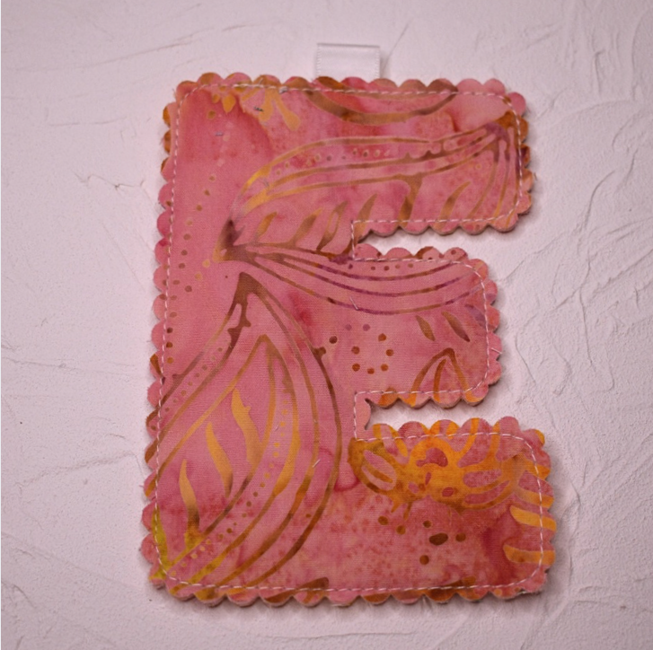 Scolloped letter - E