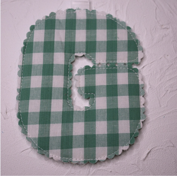 Scolloped letter - G